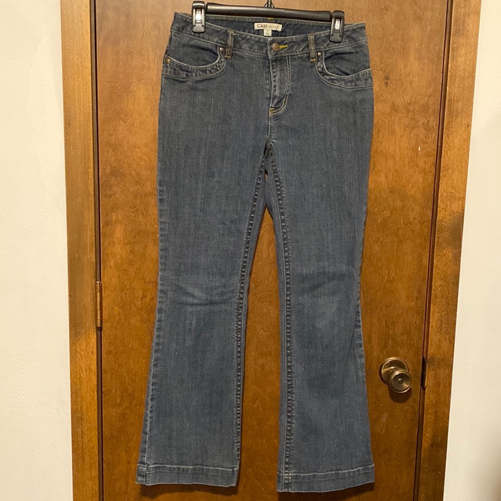 CABI blue denim mid rise jeans. Medium wash. Boot cut. Size US 6.